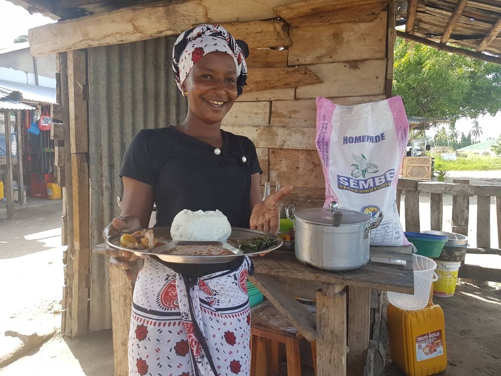 Khalima, a food trader in Tanzania, uses fortified flour to prepare meals for her customers and to feed her family. Photo: WFP/Mussa Yunus