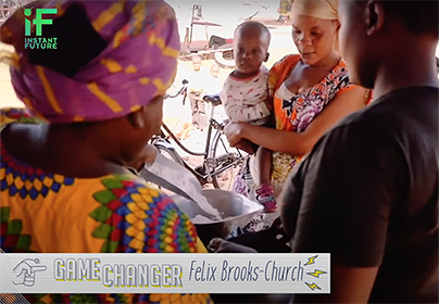 screen capture of video with young woman with baby on her hip looking at an older woman mixing grains