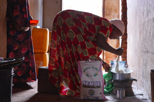 woman stirring bag of flour in Hidden Hunger short film